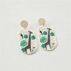 Cute Simple Milk Cow Earrings -Kawaii Fashion Shop AOMU Cute Simple Red Blue Transparent Acrylic Horse Cow Round Earrings Irregular Stitching Animal Drop Earrings 2