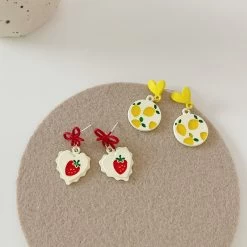 Cute Strawberry Stud Earrings 13 Cute Strawberry Stud Earrings -Kawaii Fashion Shop AOMU Fashion White Red Acrylic Love Strawberry Cherry Stud Earrings Irregular Geometric Bow Stitching Small Earrings 5