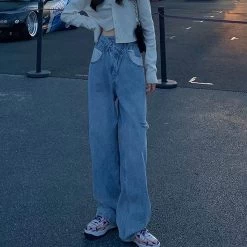 Kawaii Irregular Ripped Denim Pants 12 Kawaii Irregular Ripped Denim Pants -Kawaii Fashion Shop High Waist Trousers Slanted 2 Buttons Design Irregular Ripped Hole Wide Leg Jeans Women Summer Fashion 4